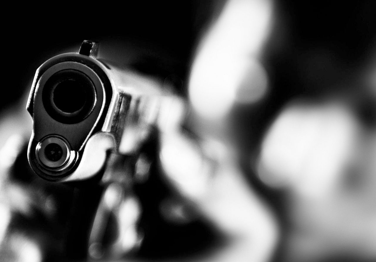 One dead, three injured by unknown assailants