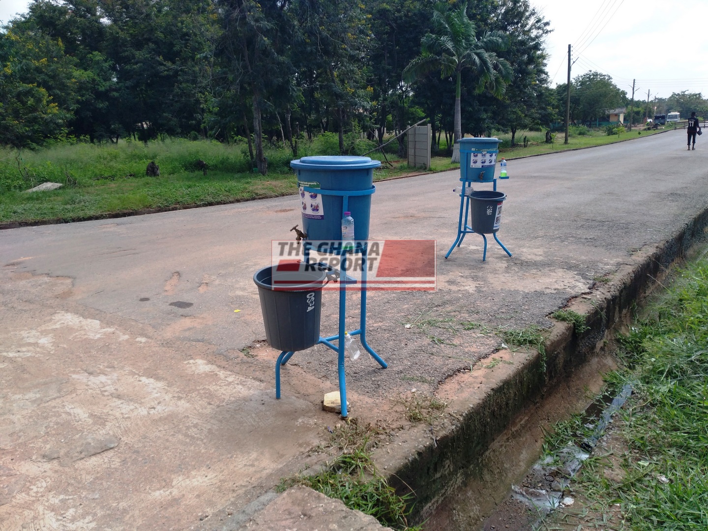 Veronica buckets at the entrance of the school