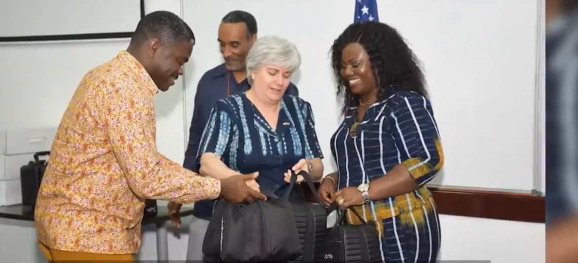 A screenshot from the YouTube channel of the U.S. Embassy in Ghana shows Ambassador Stephanie Sullivan, center, handing over Cellebrite technology to Gustav Yankson, left, director of the Ghana police cybercrime unit of the Criminal Investigation Department, and Maame Yaa Tiwaa Addo-Danquah, right, former director general of Ghana police CID.
