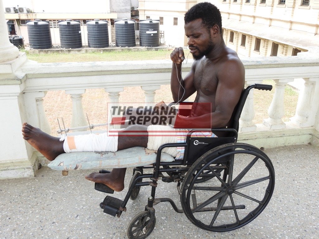 Theophilus Annang in a wheel chair at the Korle Bu Teaching Hospital