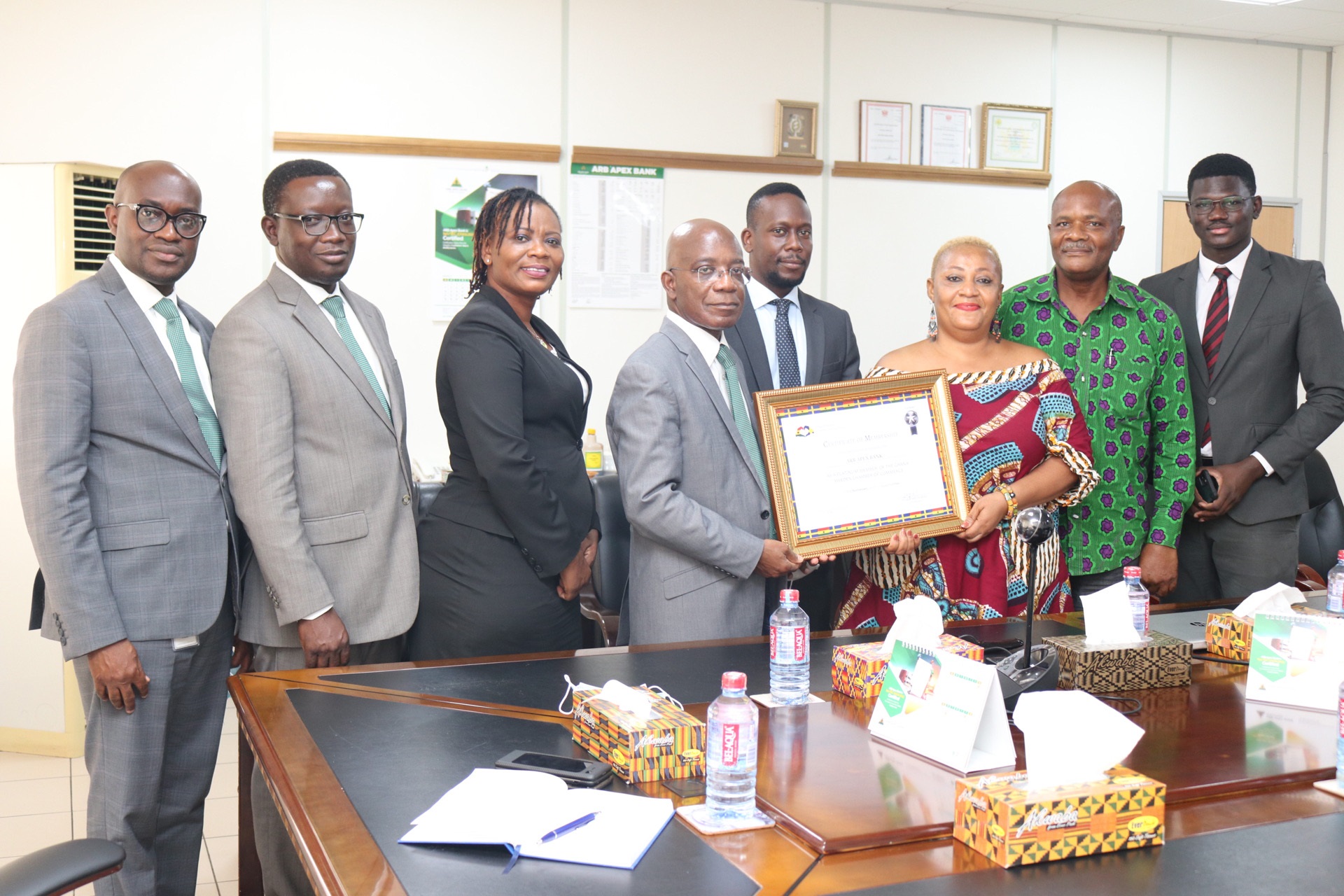 Kojo Mattah, Managing Director of ARB Apex Bank receiving the certificate from Pearl Delali Doledzi, while Isaac Vanderpuije, Founder of the Chamber (2nd from right) and Oswald Anonadaga, CEO of Floodgate Limited (extreme right)