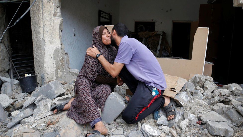 A mother hugs the son after announcement of the truce