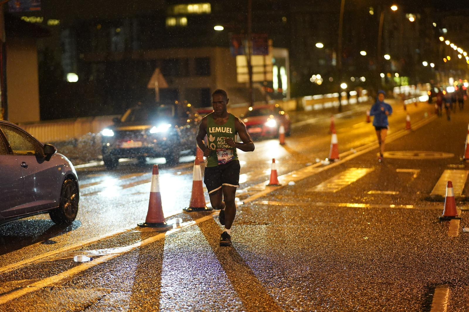 Lemuel Crentsil runs a marathon to raise funds for charity.