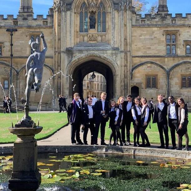 Lemuel (Second from right) and his classmates at Oxford University.