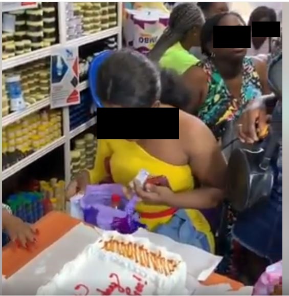 Ladies in long queues at popular shop with 'kayanmata' products displayed on the shelves 